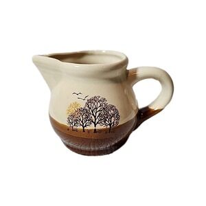 Vintage Denby Savoy creamer. Beige stoneware with autumn trees and birds Motif